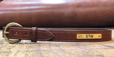 1.25" stitched classic brown bridle leather belt with solid brass plate. Classic brown
