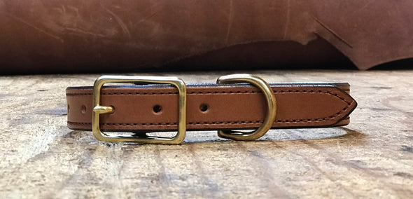 1" english bridle leather dog collar with sitting. Available in 3 colors, classic brown,havana and black. Choose from solid brass or solid nickel brass hardware.